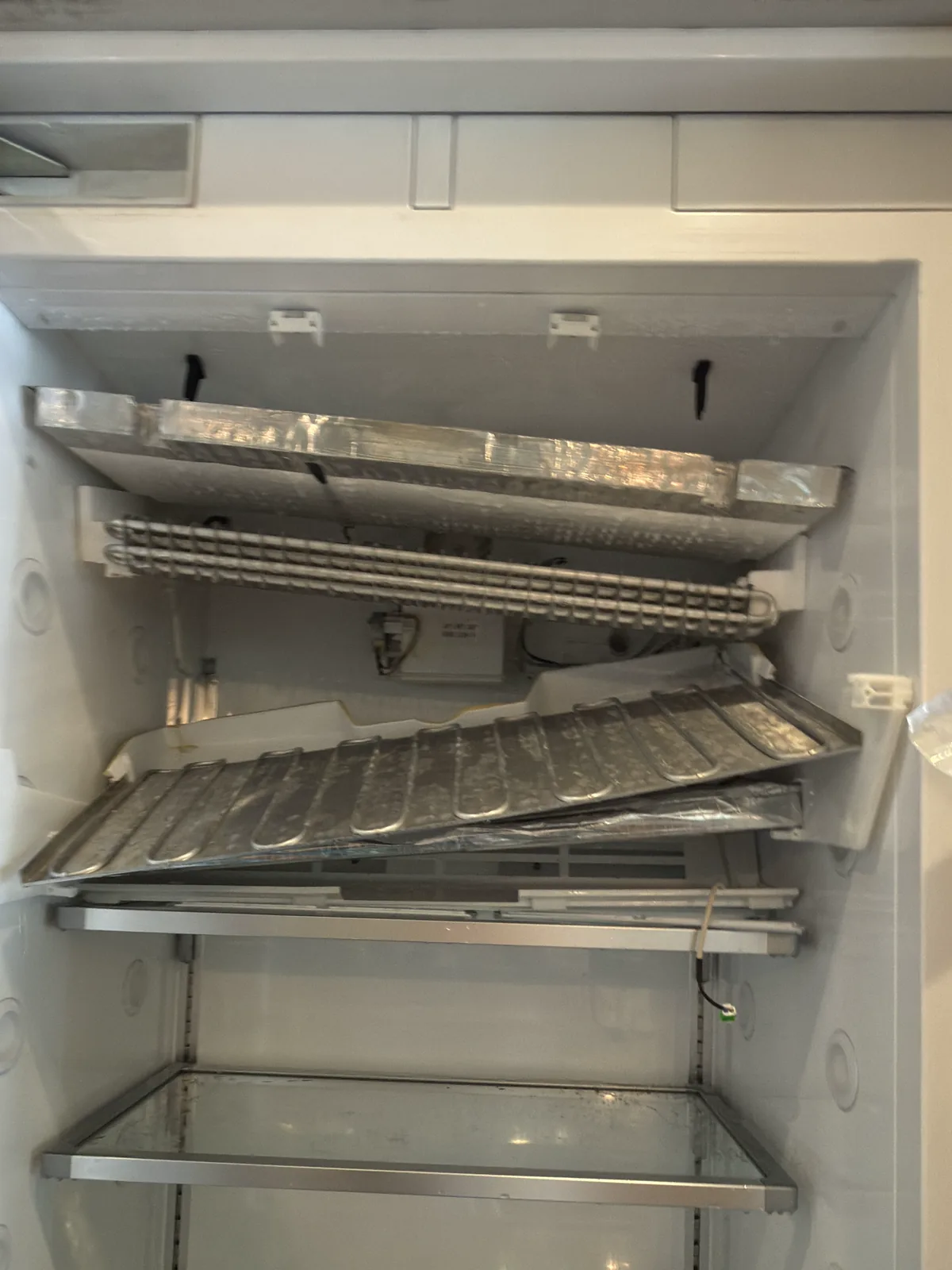 Miele K 1813 Vi built-in refrigerator evaporator compartment opened for fan and defrost repair in Danville CA