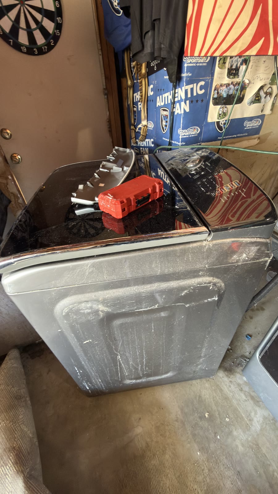 Kenmore washer opened for water valve access