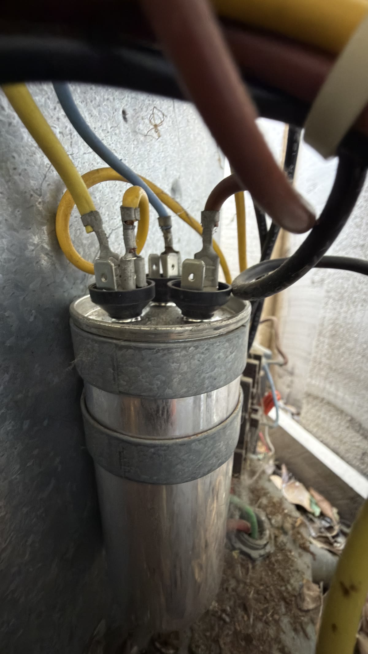 Air conditioner capacitor wiring checked during Fremont repair