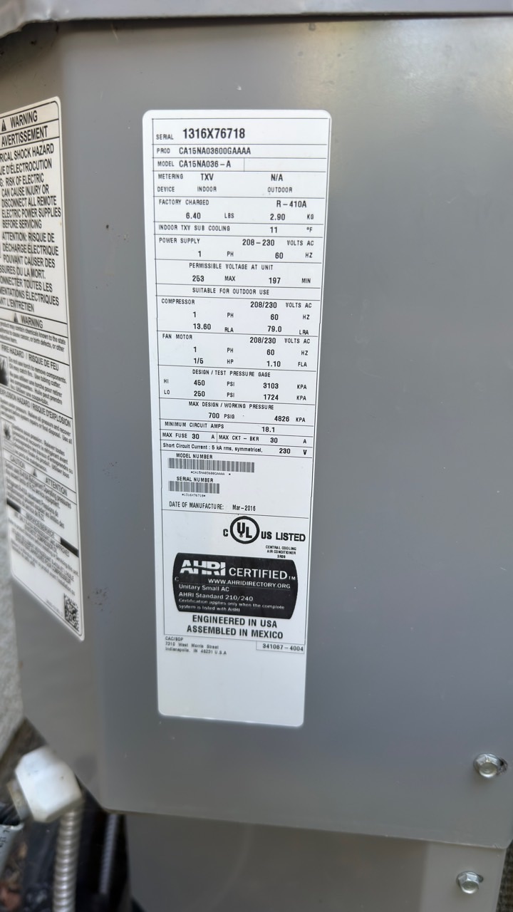 Carrier CA15NA036-A central AC model and R-410A data label in Livermore CA