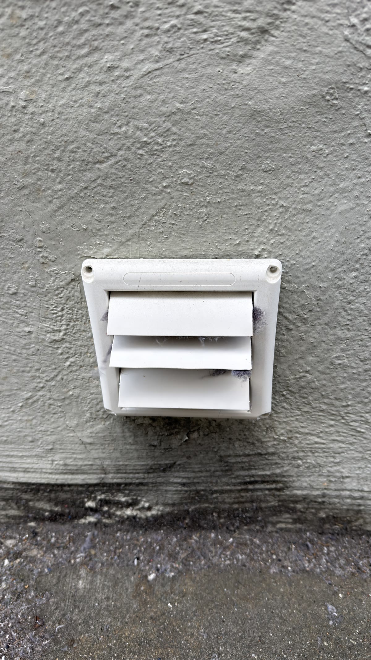 Dryer exterior exhaust vent checked during repair