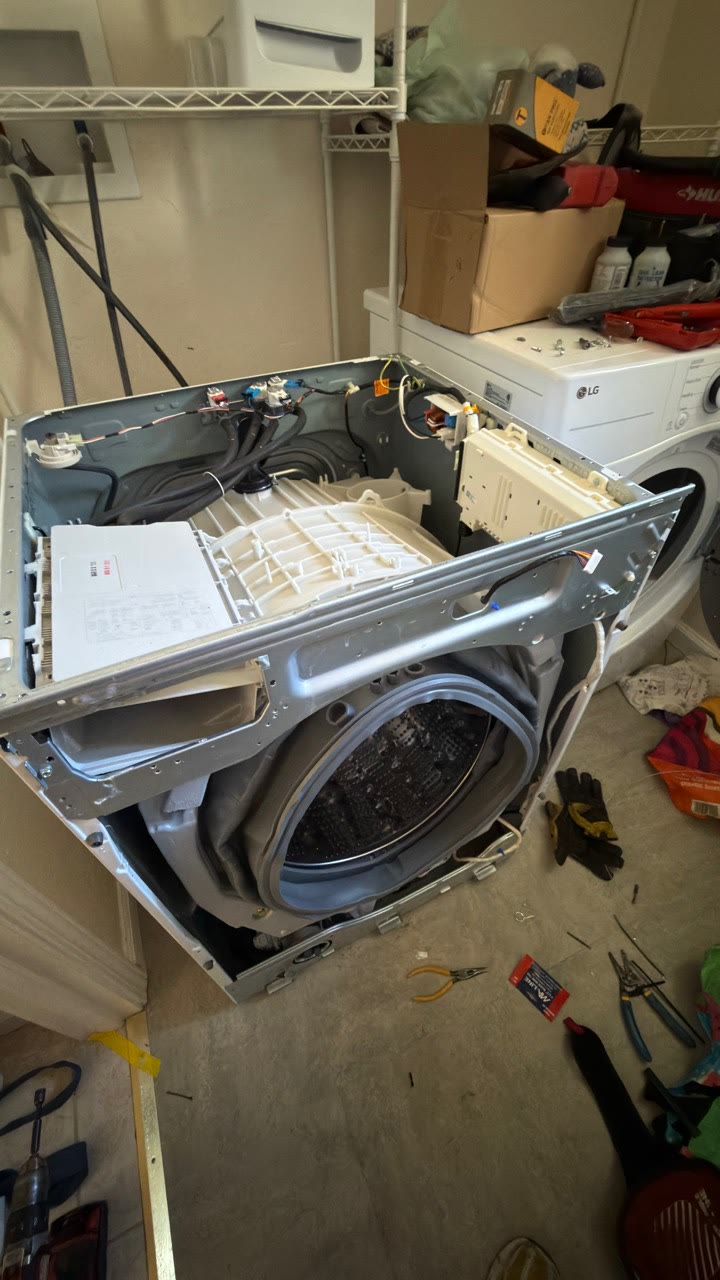 LG WM3400CW front-load washer disassembled for boot gasket replacement in Danville CA