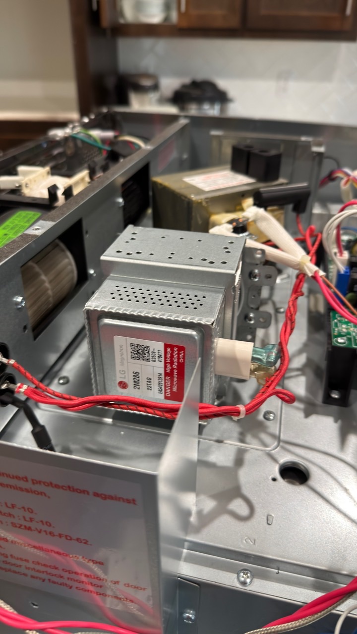 Replacement magnetron installed inside Thermador microwave model MB30WP/01